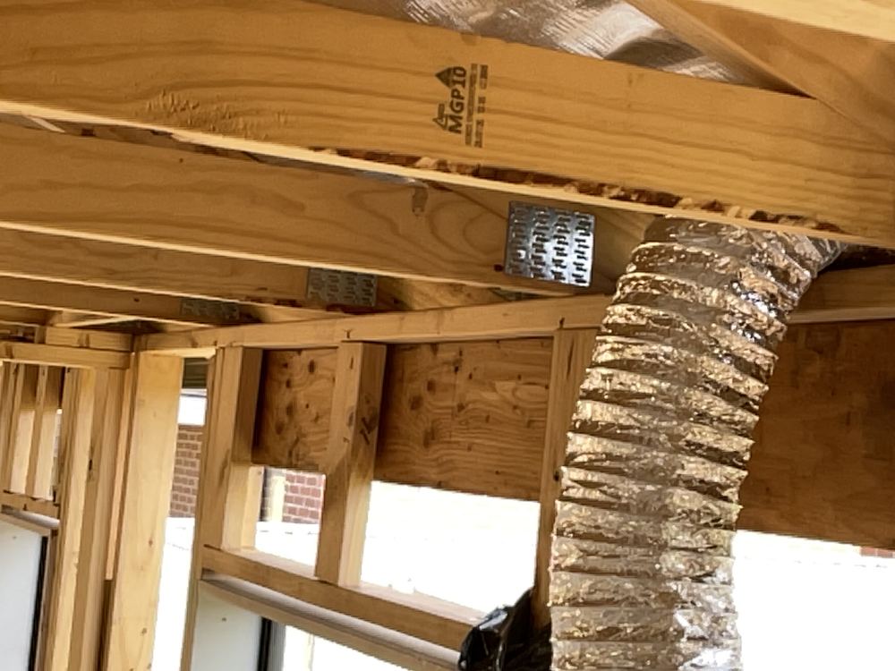 Truss grips not fitted, leaving the trusses without their tie-down hardware, Officer