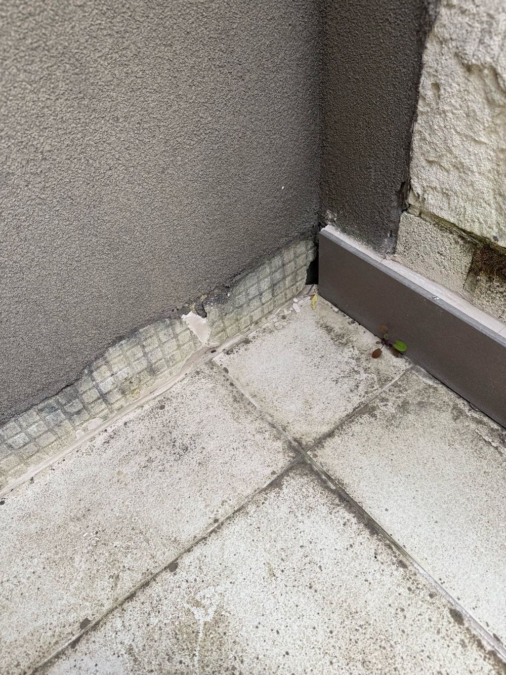 Balcony waterproofing so far gone that water passes straight into the structure, found during a defect investigation inspection in Officer